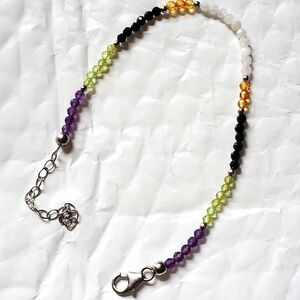 Multigemstone beaded bracelet with platinum over sterling silver clasp